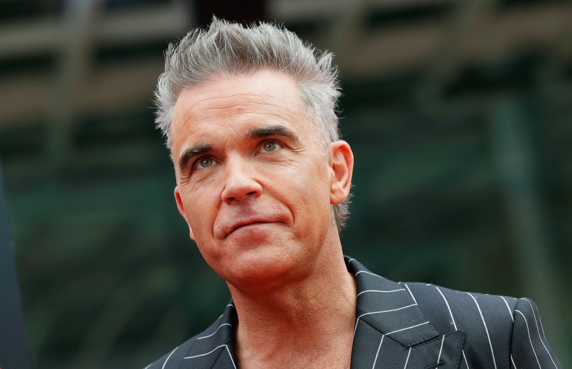 robbie-williams-espera-seguir-los-pasos-de-sir-rod-stewart